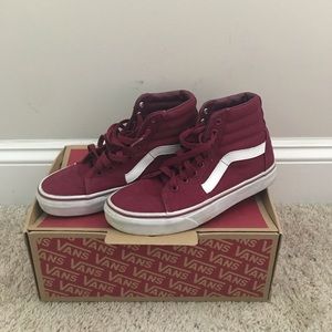 Burgundy high top Vans sneakers